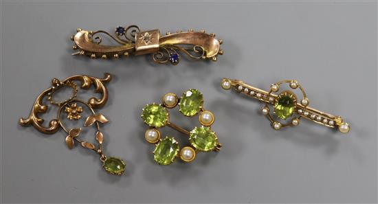 Four Victorian/Edwardian yellow metal and gem set brooches, including peridot and two 9ct gold.